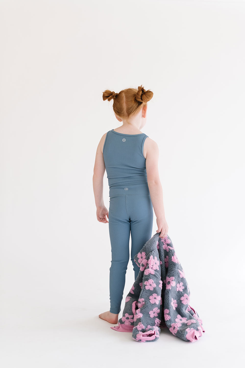 Young girl wearing Everyway kids activewear. Featuring Flower Power Jacket in Pink.