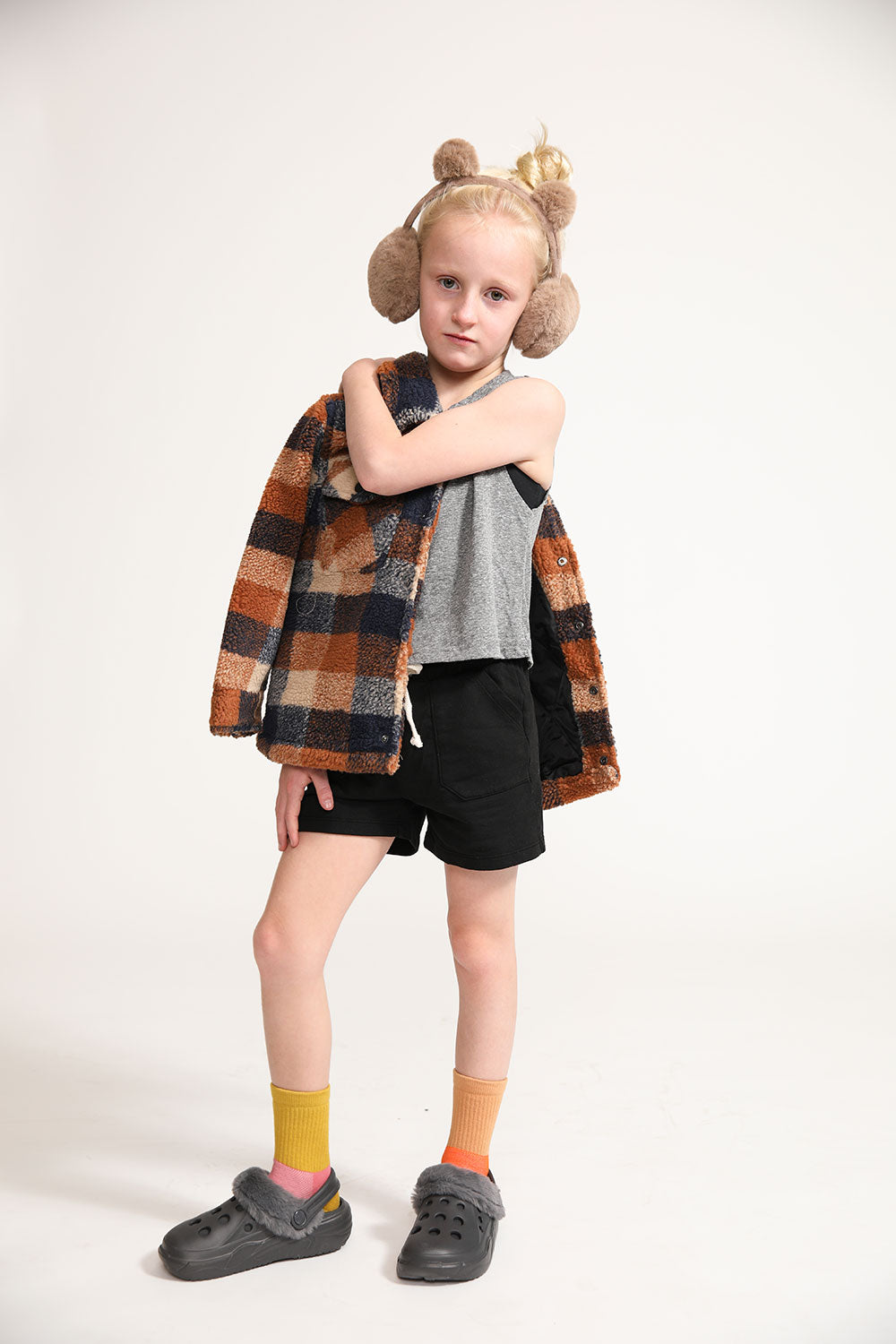 Young girl wearing Everyway kids activewear. Featuring Daily Tank Top in Heathered Gray.