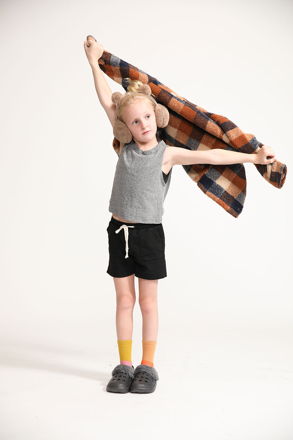 Young girl wearing Everyway kids activewear. Featuring Daily Tank Top in Heathered Gray.