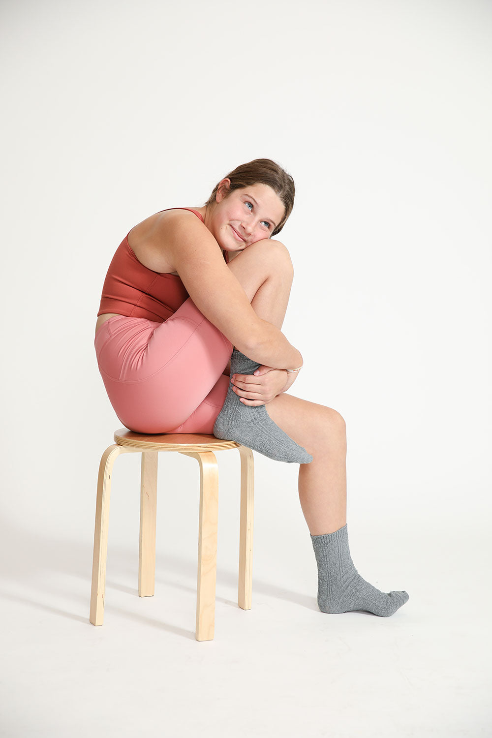 Young girl wearing Everyway kids activewear. Featuring Cycle Shorts in Dusty Rose.