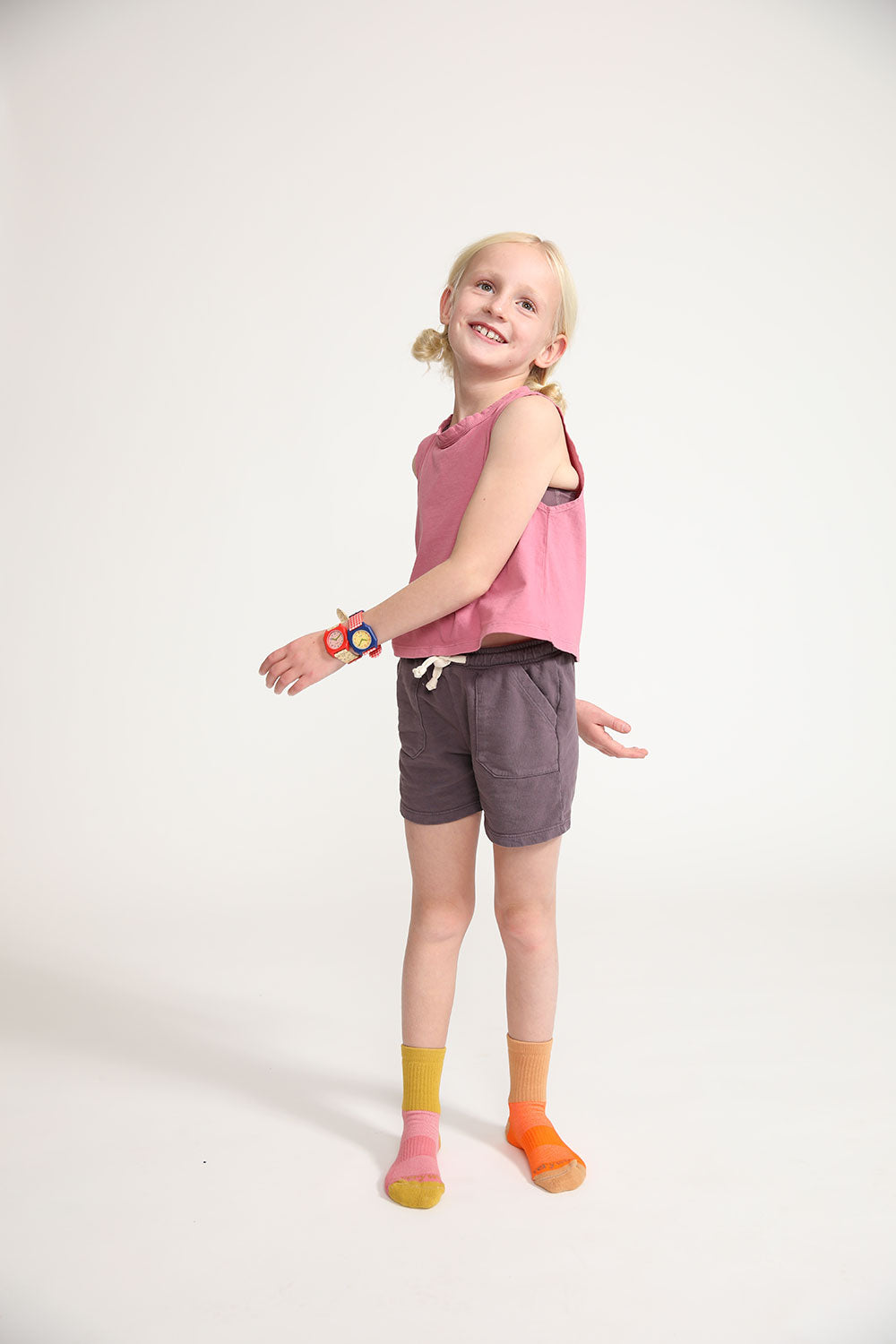 Young girl wearing Everyway kids activewear. Featuring Daily Tank Top in Dusty Rose.