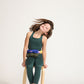 Young girl wearing Everyway kids activewear. Featuring Long Line Crop in Pine.