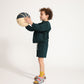 Young boy wearing Everyway kids activewear. Featuring Core Sweat Shirt in Pine.