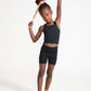 Young girl wearing Everyway kids activewear. Featuring Cycle Shorts in Black.
