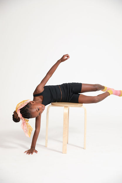 Young girl wearing Everyway kids activewear. Featuring Cycle Shorts in Black.