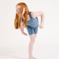 Young girl wearing Everyway kids activewear. Featuring Ribbed Cycle Shorts in Cornflower.
