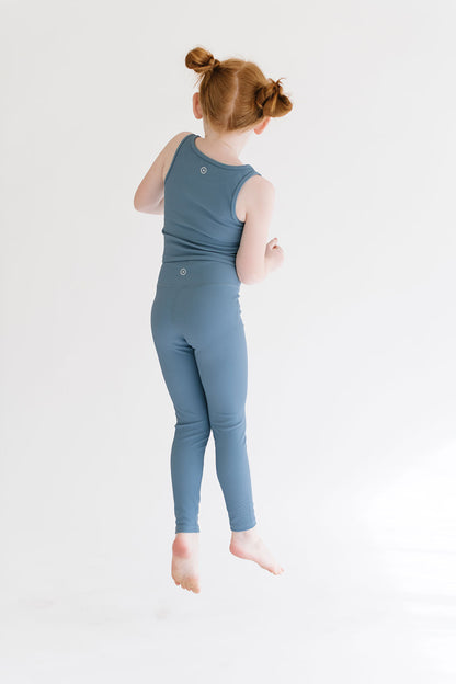 Young girl wearing Everyway kids activewear. Featuring Sporty Ribbed Leggings in Cornflower.