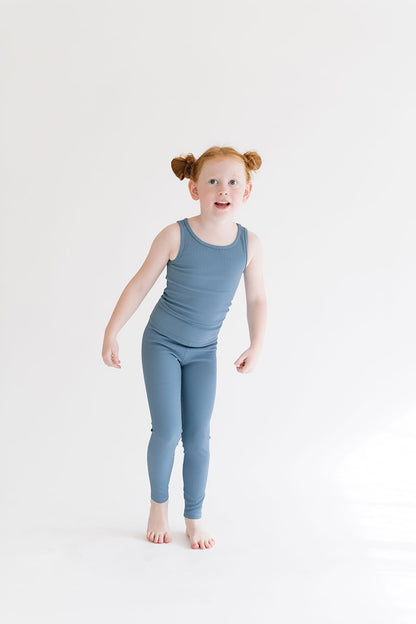 Young girl wearing Everyway kids activewear. Featuring Sporty Ribbed Leggings in Cornflower.