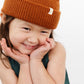 Young girl wearing Everyway kids activewear. Featuring Waffle Knit Beanie in Coffee.