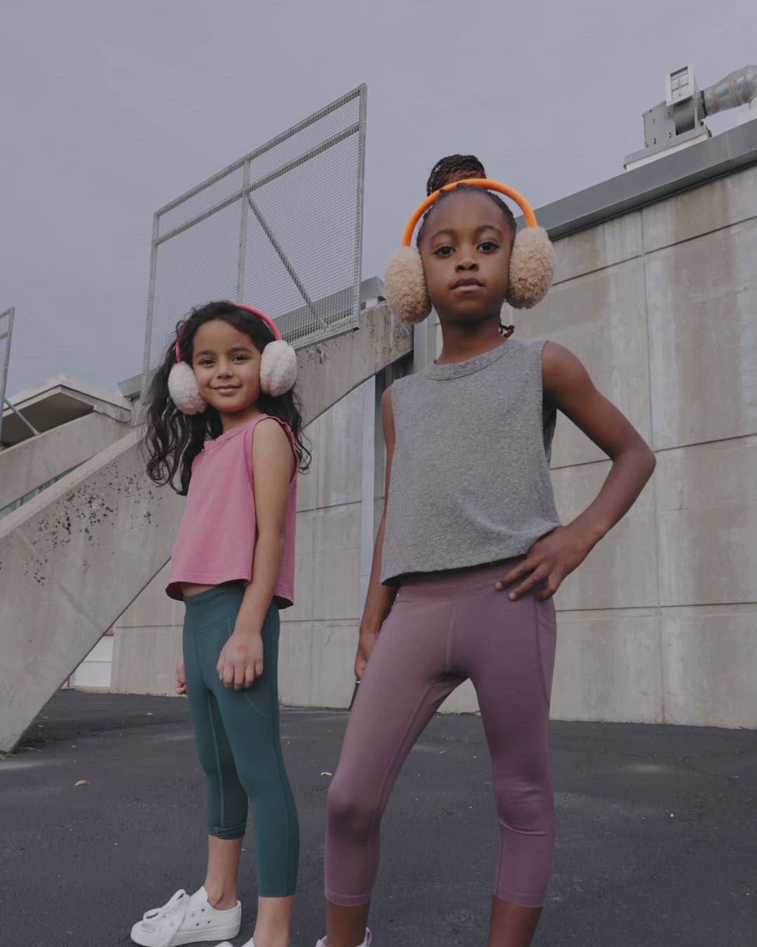A group of young kids wearing Everyway kids activewear. Featuring all day leggings and Tank Tops.